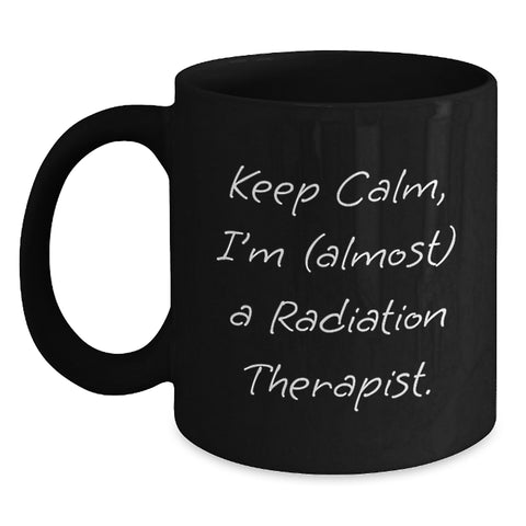 Image of Funny Radiation Therapist Gifts for Men, Women, Friends, Coworkers - Black Coffee Mug Keep Calm, I'm (almost) A Radiation Therapist. - Main
