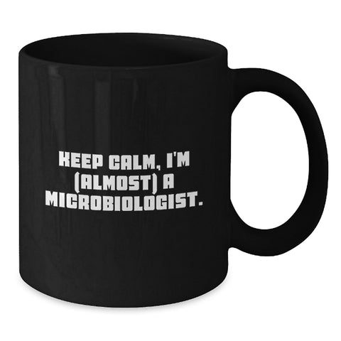 Image of Funny Microbiologist Gifts from Friends - Keep Calm, I'm (almost) A Microbiologist. Black Coffee Mug for Birthday - Additional