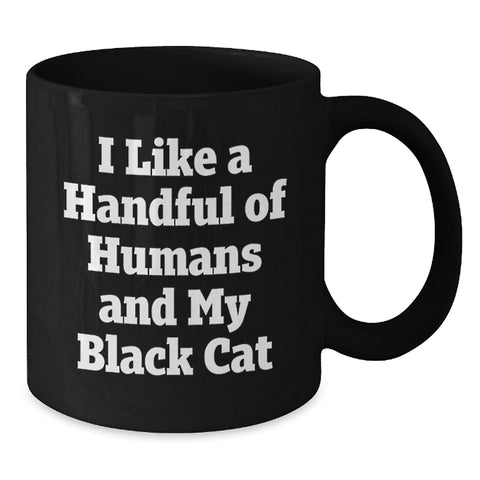 Image of Black Cat Lover Gifts, Funny Coffee Mug for Black Cat Enthusiasts, Graduation Gifts for Men, Women, Friends, and Family, Black Coffee Mug with I Like A Handful Of Humans And My Black Cat Quote - Additional
