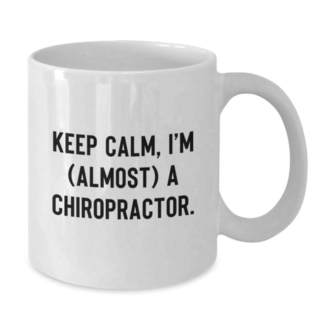 Image of Funny Chiropractor White Coffee Mug Gifts for Chiropractor Men - 'Keep Calm, I'm (almost) A Chiropractor', Unique Father's Day Unique Gifts from Family to Son - Additional