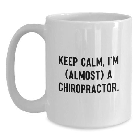 Image of Funny Chiropractor White Coffee Mug Gifts for Chiropractor Men - 'Keep Calm, I'm (almost) A Chiropractor', Unique Father's Day Unique Gifts from Family to Son - Main
