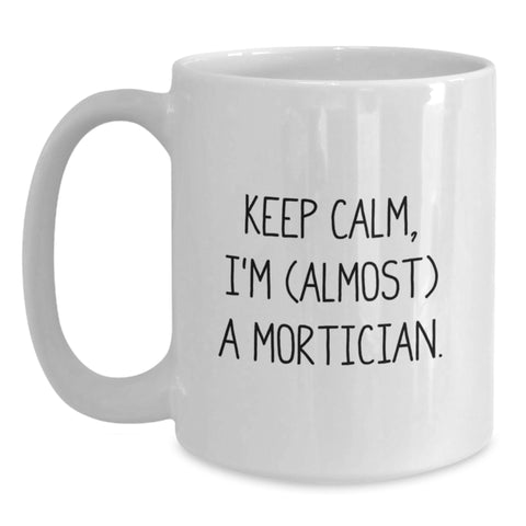 Image of Funny Mortician Gifts, Graduation Unique Gifts, White Coffee Mug - 'Keep Calm, I'm (almost) A Mortician.' - Main