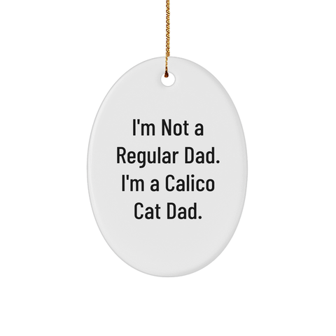 Image of Calico Cat Dad Oval Ornament, Funny Quote, White Sturdy MDF, 3" x 1.5", Gold-tone String, Gifts from Men to Calico Cat Lovers, Gifts for Calico Cat Owners, Unique Christmas Unique Gift - Image 1