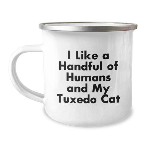 Image of Funny Tuxedo Cat Gifts for Men, Women, Friends, Coworkers, Family from Men, Women, Friends, Coworkers, Family - Camping Mug with 'I Like A Handful Of Humans And My Tuxedo Cat' Quote - Image 1