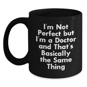 Funny Doctor Gifts, Black Coffee Mug for Birthday - 'I'm Not Perfect But I'm A Doctor And That's Basically The Same Thing' Doctor Mug from Friends or Family - Main