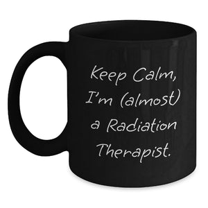 Funny Radiation Therapist Gifts for Men, Women, Friends, Coworkers - Black Coffee Mug Keep Calm, I'm (almost) A Radiation Therapist. - Main