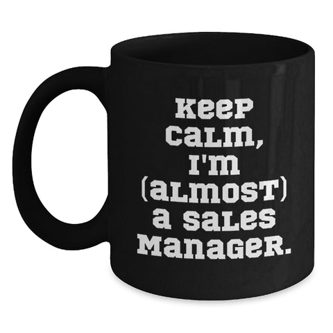 Image of Funny Sales Manager Gifts: Black Coffee Mug, 'Keep Calm, I'm (almost) A Sales Manager.' for Birthday, Gifts from Friends or Coworkers - Main