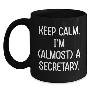 Funny Secretary Gifts from Friends, Cute Black Coffee Mugs for Graduation Unique Gifts, 'Keep Calm I'm almost a Secretary' Quote, Black Ceramic Mug, 11oz or 15oz - Main