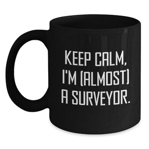 Funny Surveyor Gifts, 'Keep Calm, I'm (almost) A Surveyor' Black Coffee Mug, Graduation Unique Gifts from Friends or Family to Surveyor or Men - Main