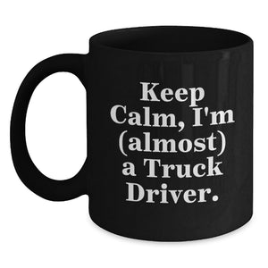 Funny Truck Driver Gifts for Men - 'Keep Calm, I'm (almost) A Truck Driver.' Truck Driver Black Coffee Mug, Graduation Unique Gifts for Friends or Coworkers - Main