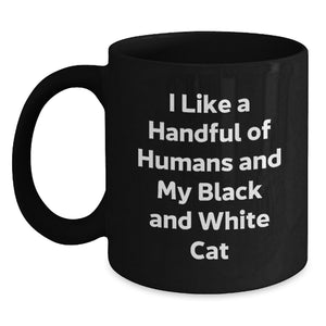 Funny Black and White Cat Gifts for Friends, Black Coffee Mug with Cute Quote I Like A Handful Of Humans And My Black And White Cat, Graduation Unique Gifts from Friends to Men - Main