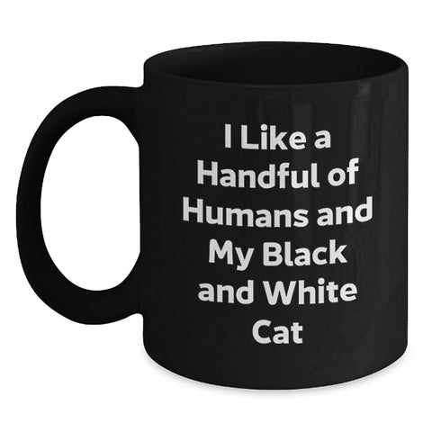 Image of Funny Black and White Cat Gifts for Friends, Black Coffee Mug with Cute Quote I Like A Handful Of Humans And My Black And White Cat, Graduation Unique Gifts from Friends to Men - Main