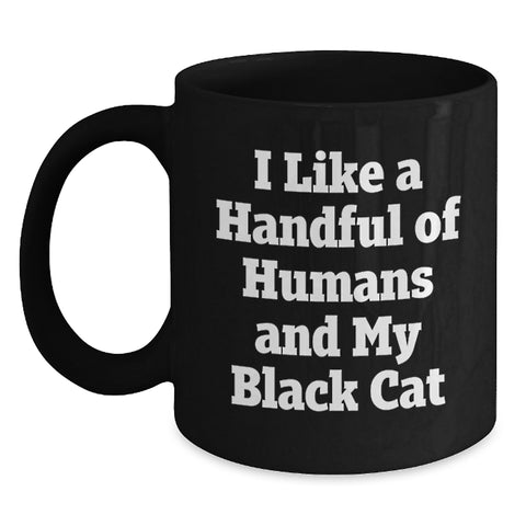Image of Black Cat Lover Gifts, Funny Coffee Mug for Black Cat Enthusiasts, Graduation Gifts for Men, Women, Friends, and Family, Black Coffee Mug with I Like A Handful Of Humans And My Black Cat Quote - Main