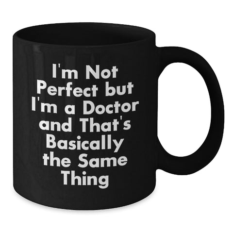 Image of Funny Doctor Gifts, Black Coffee Mug for Birthday - 'I'm Not Perfect But I'm A Doctor And That's Basically The Same Thing' Doctor Mug from Friends or Family - Additional