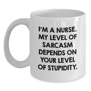 Funny Nurse Gifts from Friends for Christmas Unique Coffee Mugs, White, 'I'm A Nurse. My Level Of Sarcasm Depends On Your Level Of Stupidity.' - Main