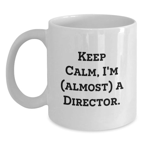 Image of Funny Director Gifts from Friends, White Coffee Mug for Graduation, Quirky 'Keep Calm, I'm (almost) A Director' Quote, 11oz or 15oz Ceramic Mug, Microwave and Dishwasher Safe - Main