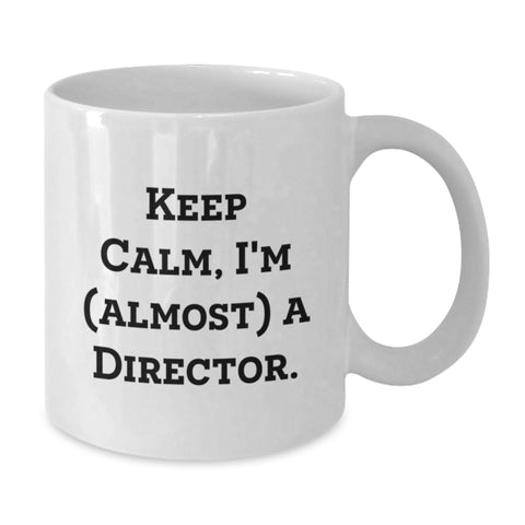 Image of Funny Director Gifts from Friends, White Coffee Mug for Graduation, Quirky 'Keep Calm, I'm (almost) A Director' Quote, 11oz or 15oz Ceramic Mug, Microwave and Dishwasher Safe - Additional
