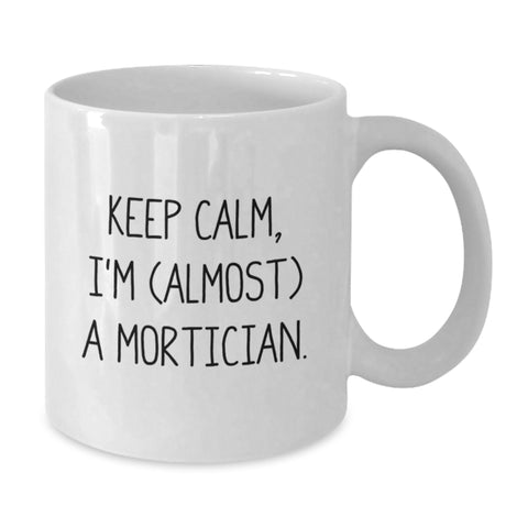 Image of Funny Mortician Gifts, Graduation Unique Gifts, White Coffee Mug - 'Keep Calm, I'm (almost) A Mortician.' - Additional