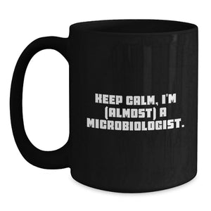 Funny Microbiologist Gifts from Friends - Keep Calm, I'm (almost) A Microbiologist. Black Coffee Mug for Birthday