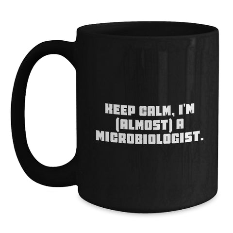Image of Funny Microbiologist Gifts from Friends - Keep Calm, I'm (almost) A Microbiologist. Black Coffee Mug for Birthday - Main
