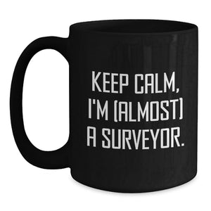 Funny Surveyor Gifts, 'Keep Calm, I'm (almost) A Surveyor' Black Coffee Mug, Graduation Unique Gifts from Friends or Family to Surveyor or Men