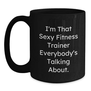 Funny Fitness Trainer Gifts from Friends for Men, 11oz/15oz Black Coffee Mug - 'I'm That Sexy Fitness Trainer Everybody's Talking About.