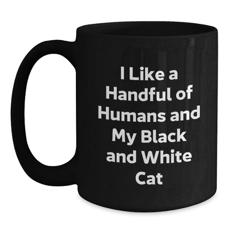 Image of Funny Black and White Cat Gifts for Friends, Black Coffee Mug with Cute Quote I Like A Handful Of Humans And My Black And White Cat, Graduation Unique Gifts from Friends to Men - Main
