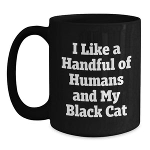 Black Cat Lover Gifts, Funny Coffee Mug for Black Cat Enthusiasts, Graduation Gifts for Men, Women, Friends, and Family, Black Coffee Mug with I Like A Handful Of Humans And My Black Cat Quote