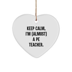 Funny Quotes for PE Teachers, Keep Calm I'm almost a PE Teacher Heart Ornament, Perfect PE Teacher Gift for Christmas - Image 1