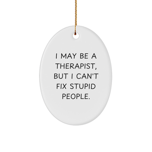 Therapist Gifts from Friends - Funny Oval Ornament for Christmas 'I May Be A Therapist, But I Can't Fix Stupid People.' - Image 1