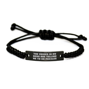Funny Puzzles Gifts from Friends for Mother's Day Unique Rope Braclet, 'The Voices In My Head Are Telling Me To Go Puzzles' Quote, Adjustable Black Stainless Steel with Interlaced Rope - Image 1