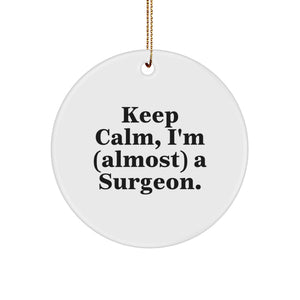 Funny Surgeon Gifts from Friends and Family - Keep Calm, I'm (almost) A Surgeon Circle Ornament for Christmas - Image 1