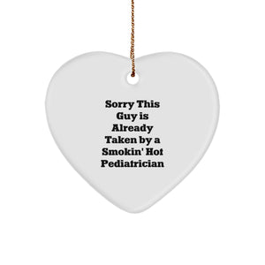 Funny Pediatrician Gifts from Family - Sorry This Guy Is Already Taken By A Smokin' Hot Pediatrician Heart Ornament for Christmas - Image 1