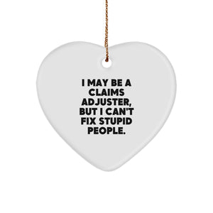 Funny Claims Adjuster Gifts for Christmas - 'I May Be A Claims Adjuster, But I Can't Fix Stupid People.' Heart Ornament from Friends, Family, or Coworkers - Image 1