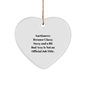 Auctioneer Gifts from Friends, Family, and Coworkers for that Special Someone - 'Auctioneer. Because Classy Sassy And A Bit Fearlessy Is Not An Official Job Title.' Heart Ornament for Christmas - Image 1