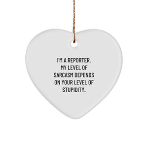 Funny Reporter Gifts for Men Christmas Heart Ornament from Friends, 'I'm A Reporter. My Level Of Sarcasm Depends On Your Level Of Stupidity.' - Image 1