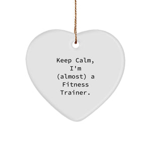 Funny Fitness Trainer Heart Ornament, Christmas Unique Gifts from Friends to Fitness Trainers, Keep Calm I'm (almost) A Fitness Trainer. - Image 1