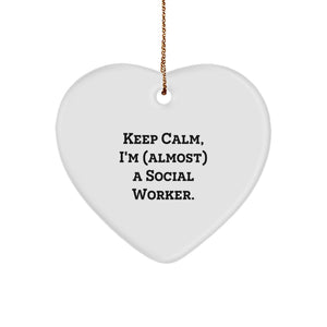 Funny Social Worker Gifts - Keep Calm, I'm (almost) A Social Worker. Heart Ornament for Christmas - Image 1