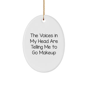Funny Makeup Gifts for Women Friends Family from Christmas Oval Ornament 'The Voices In My Head Are Telling Me To Go Makeup' - Image 1