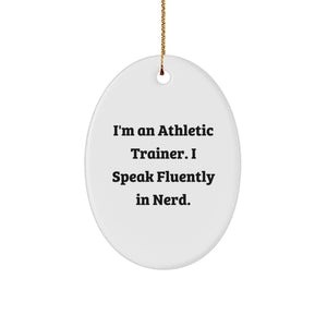 Funny Quote from Athletic Trainer, Oval Ornament Gifts for Men, White Christmas Unique Finds, Gifts from Family, Friends to Athletic Trainers, I'm An Athletic Trainer. I Speak Fluently In genius. - Image 1
