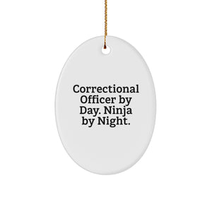 Correctional Officer Gifts, Funny Christmas Oval Ornament, Correctional Officer By Day. Ninja By Night. Christmas Unique Gifts from Friends - Image 1