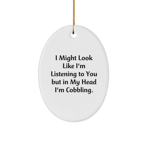 Funny Cobbling Gifts from Friends, Christmas Unique Oval Ornament 'I Might Look Like I'm Listening To You But In My Head I'm Cobbling.' for Men and Women - Image 1
