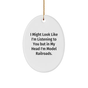 Funny Model Railroads Oval Ornament Gifts from Friends for Christmas, 'I Might Look Like I'm Listening To You But In My Head I'm Model Railroads.' - Image 1