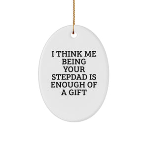Funny Stepdad Gift, I Think Me Being Your Stepdad Is Enough Of A Gift, Oval Ornament, White, 3.25'' Tall, Perfect for Christmas - Image 1