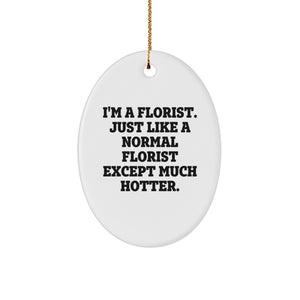 Funny Florist Gifts from Friends for Christmas - 'I'm A Florist. Just Like A Normal Florist Except Much Hotter.' Oval Ornament - Image 1
