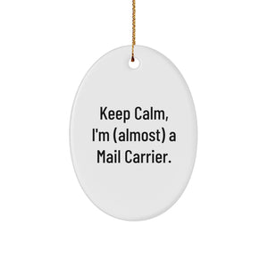 Funny Mail Carrier Gifts - Keep Calm, I'm (almost) A Mail Carrier. Oval Ornament for Christmas, Unique Presents from Friends and Family to Mail Carrier Men - Image 1