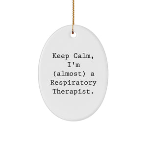 Respiratory Therapist Gifts from Friends, Christmas Unique Oval Ornament with 'Keep Calm, I'm (almost) A Respiratory Therapist.' Quote, for Women or Men - Image 1