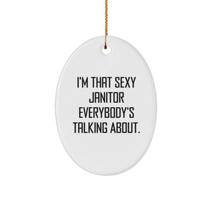 Funny Janitor Gifts from Men for Janitor, I'm That Sexy Janitor Everybody's Talking About. Oval Ornament, White Christmas Unique Gifts - Image 1