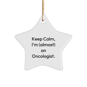 Funny Oncologist Gifts from Men to Women and Friends, Star Ornament for Christmas Unique Gifts, 'Keep Calm, I'm (almost) An Oncologist.' - Image 1
